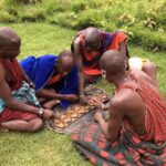 moses-relatives-playing-a-traditional-maasai-game-called-enkehei